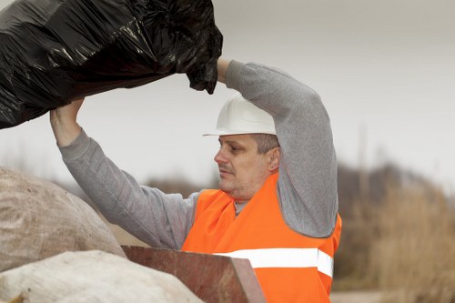 Professional garden waste removal service in action